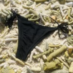 Black mid-rise Chloe Bottom bikini with adjustable tie sides for a perfect fit.