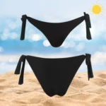 Chic black Ava Bottom bikini with adjustable ties for a stylish beach look.