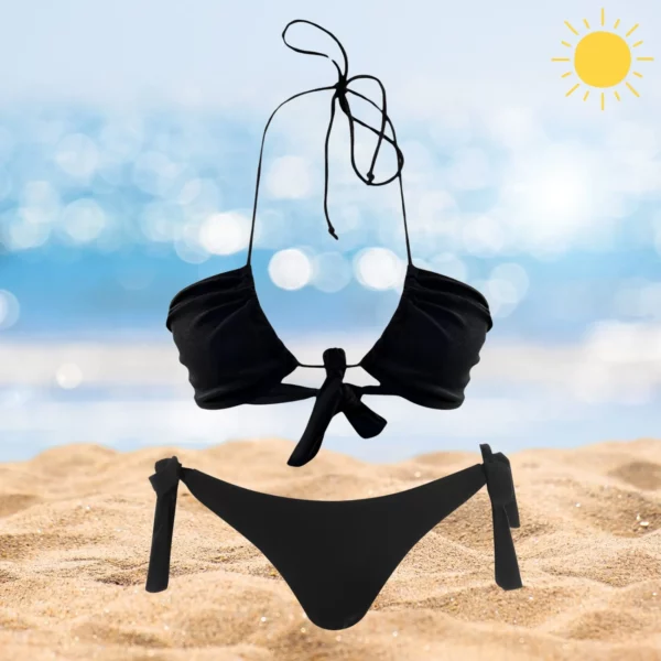 Chic Layla & Ava black beachwear set with adjustable ties and tan-through fabric.