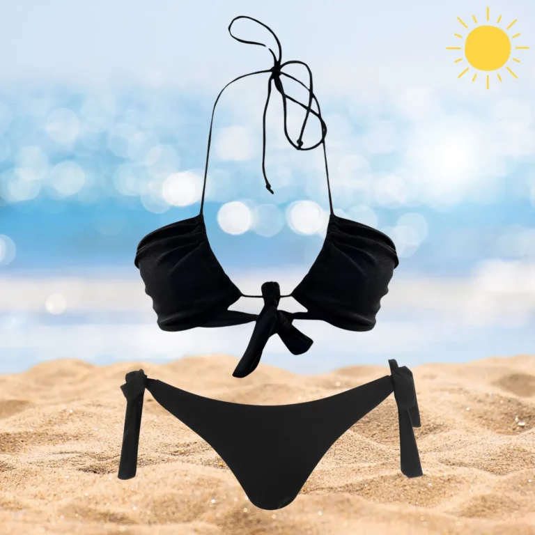 Chic Layla & Ava black beachwear set with adjustable ties and tan-through fabric.