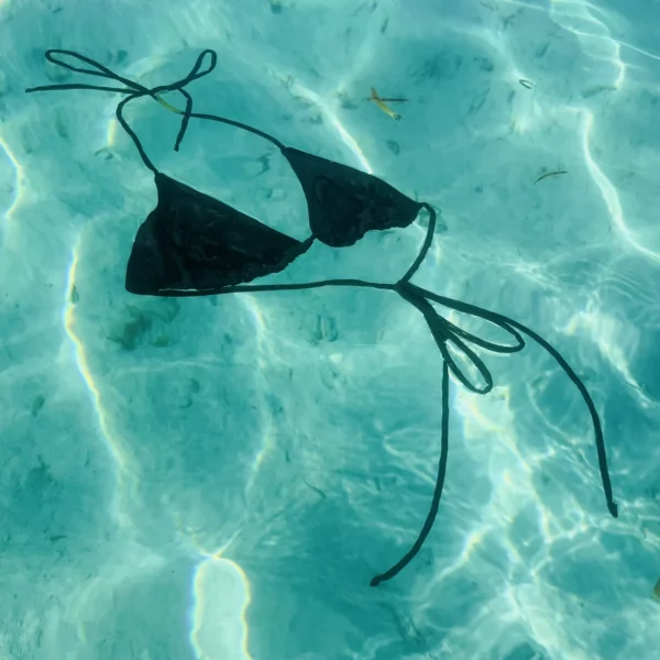 Black Kira Top triangle bikini with adjustable ties and unlined fabric.