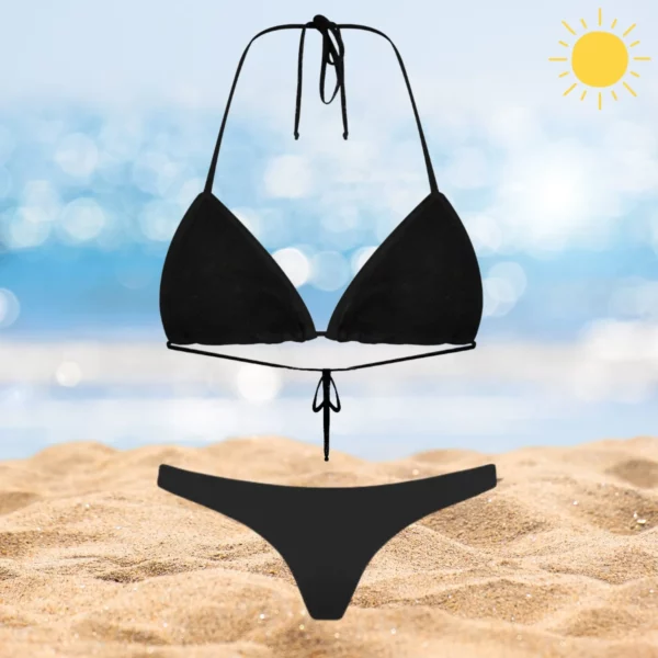 Black Kira & Zara beachwear set with adjustable ties and cheeky coverage.